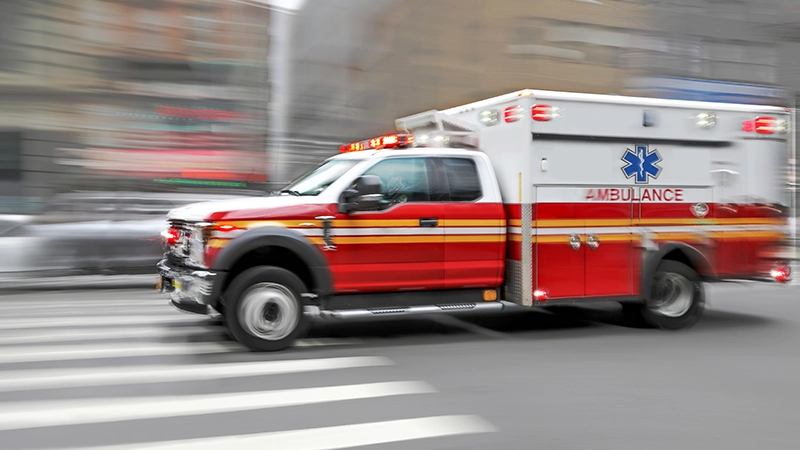 Ambulance on emergency car in motion blur.