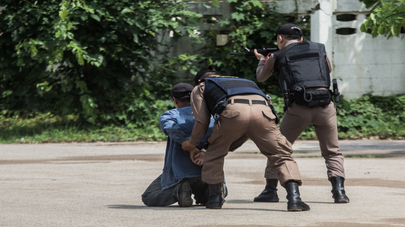 Police steel handcuffs, Police arrested, Professional police officer has to be very strong, Officer Arresting.